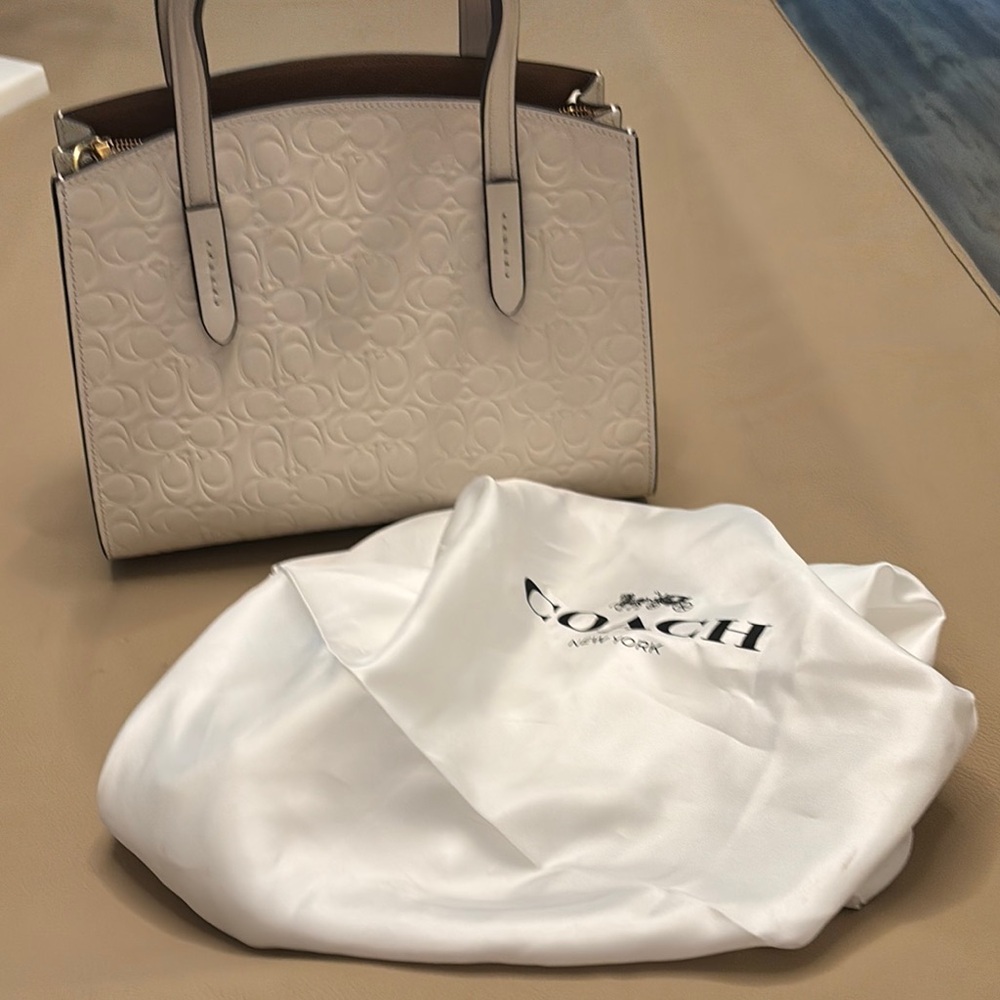 SOLD
Coach Cream Embossed Women's Bag
